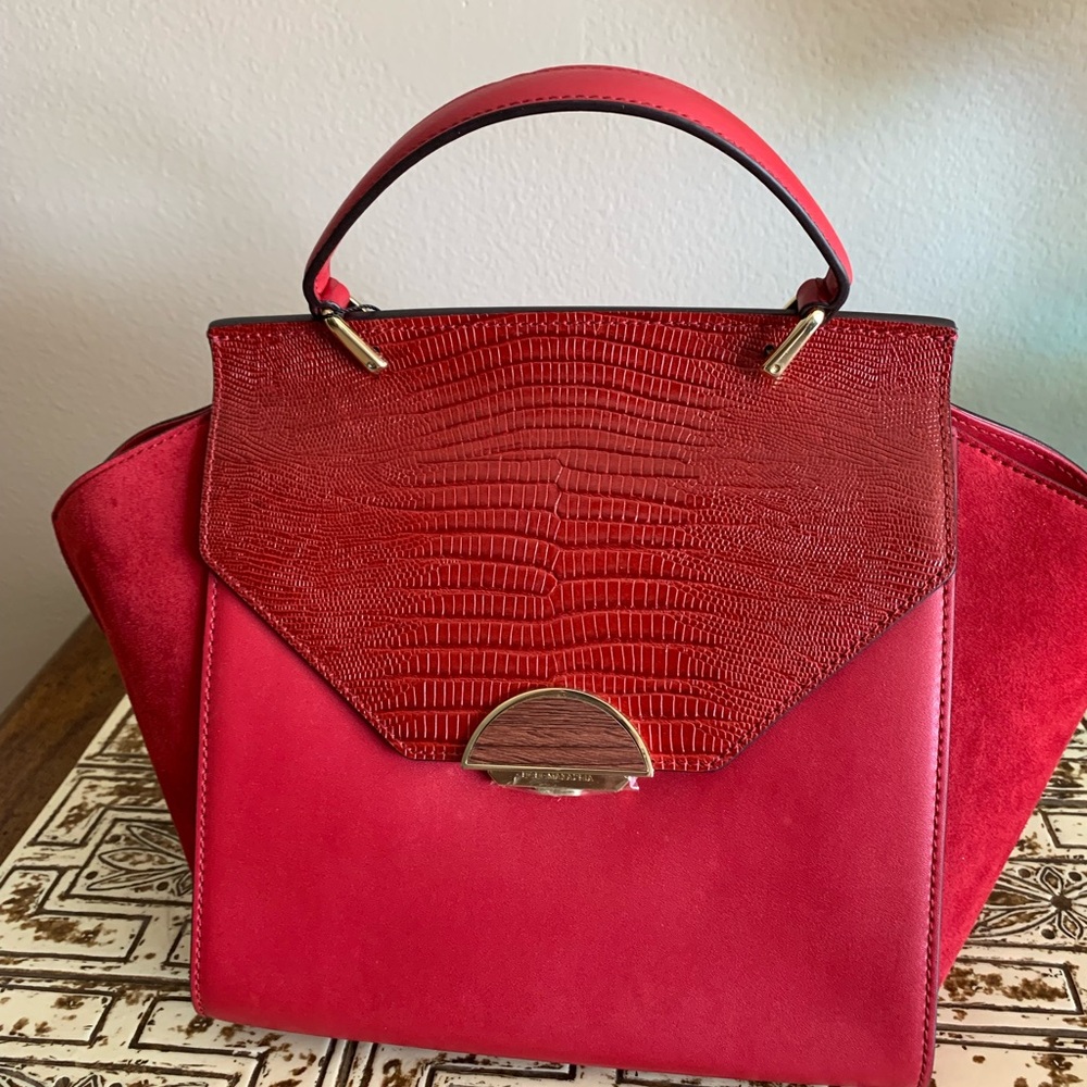 Genuine leather elegant red handbag. Brand new